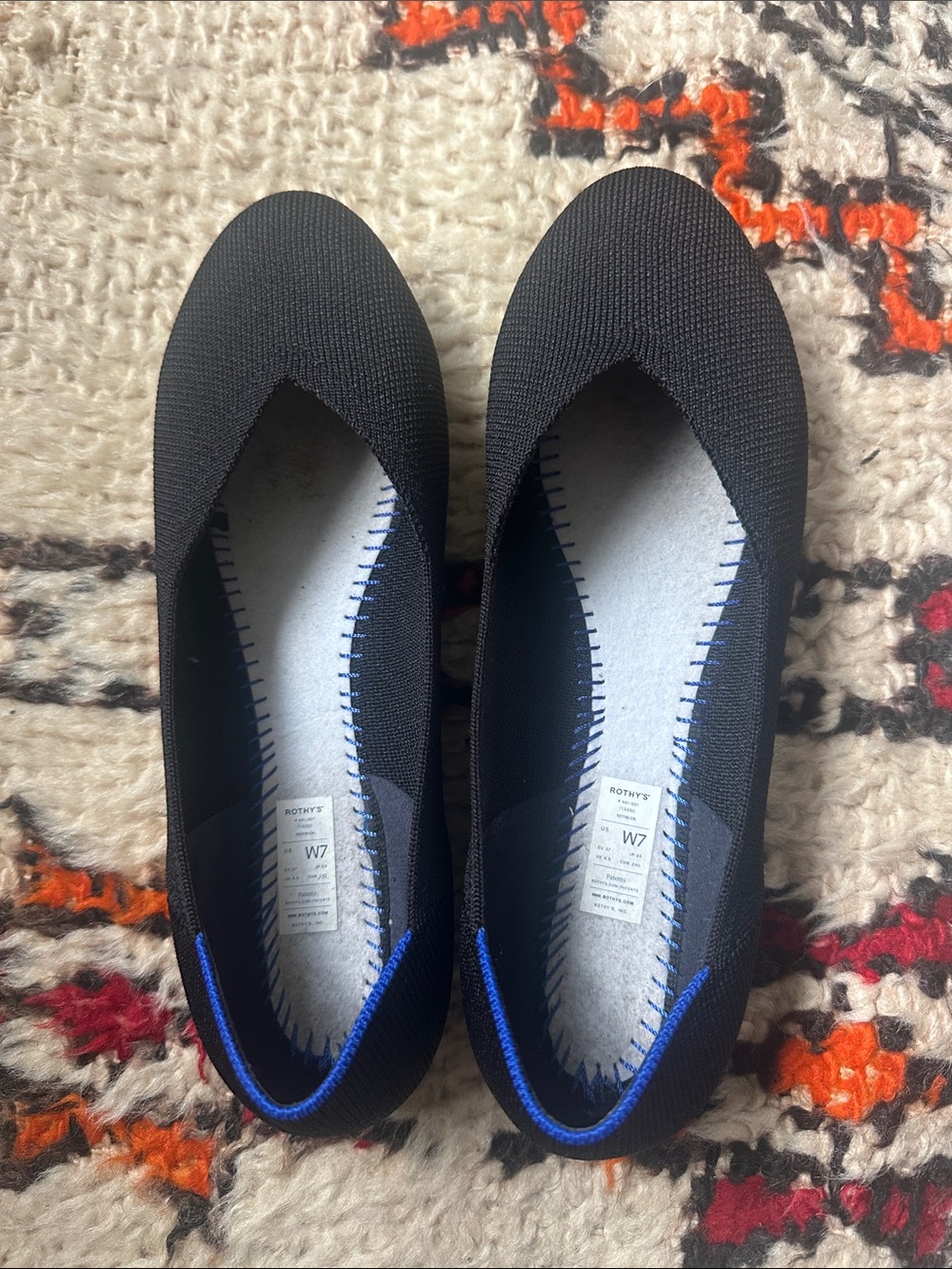 Rothy's Black Ballet Flats with Blue Accent Trim